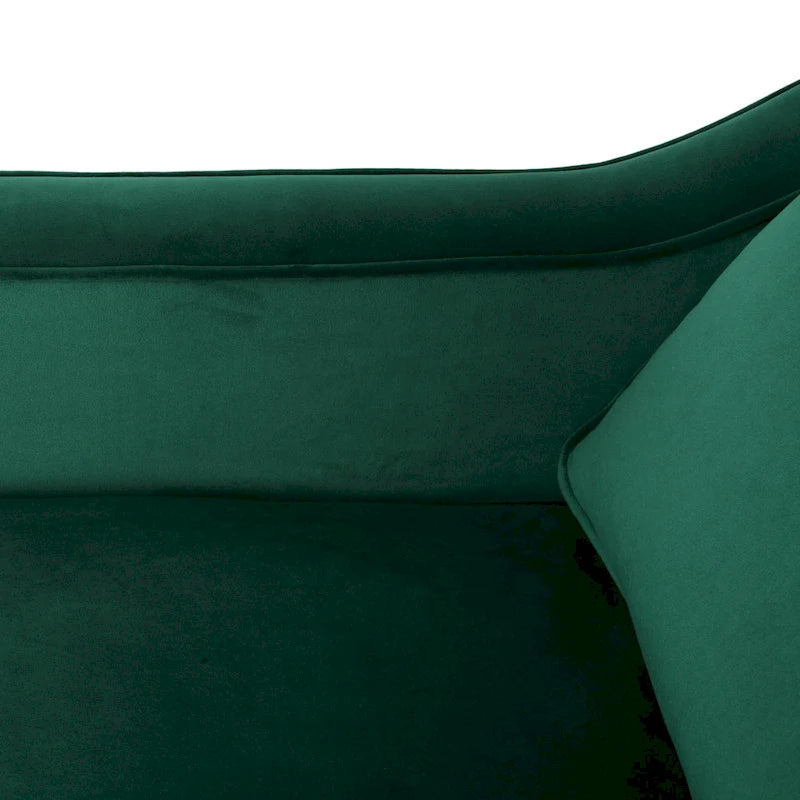 Fauteuil club contemporain en velours avec accoudoirs inclinés et pieds en bois de bouleau