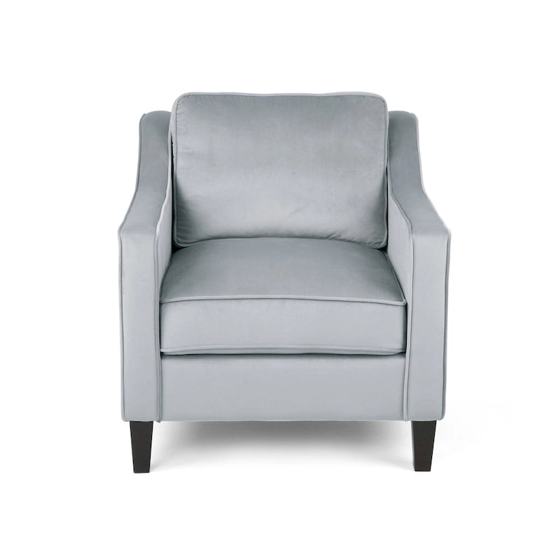Fauteuil club contemporain en velours avec accoudoirs inclinés et pieds en bois de bouleau