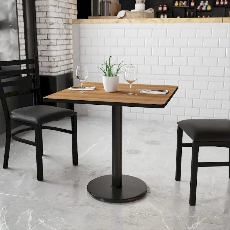 Table de salle à manger carrée avec plateau stratifié et pied central rond, noir