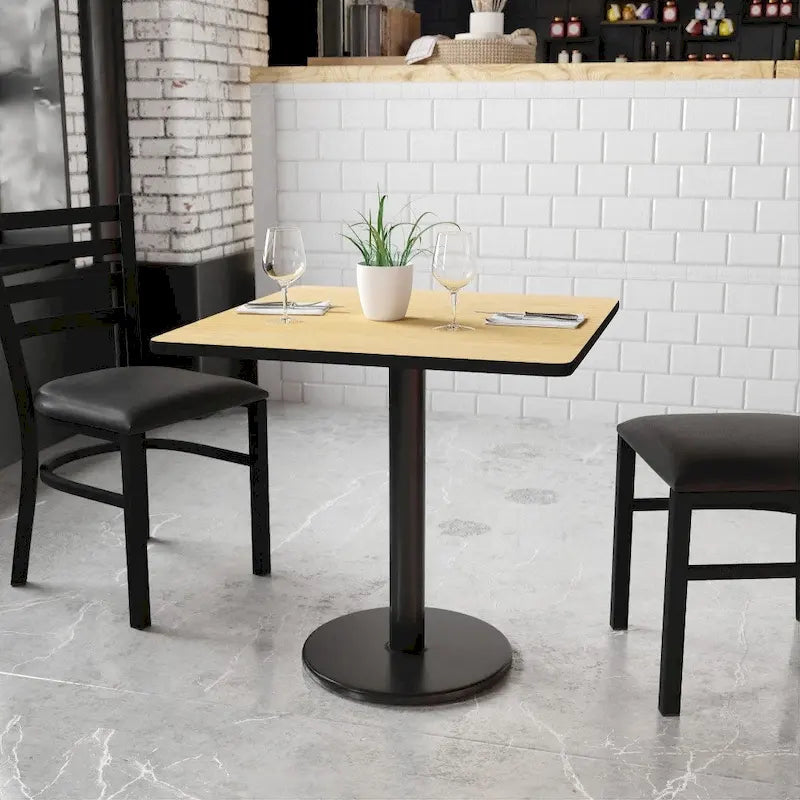 Table de salle à manger carrée avec plateau stratifié et pied central rond, noir