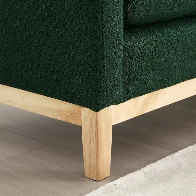 Banc rembourré avec pieds en bois cannelés et traversins