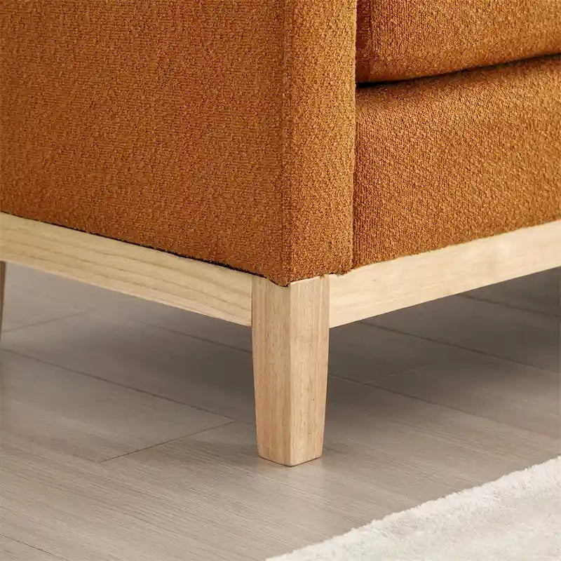 Banc rembourré avec pieds en bois cannelés et traversins